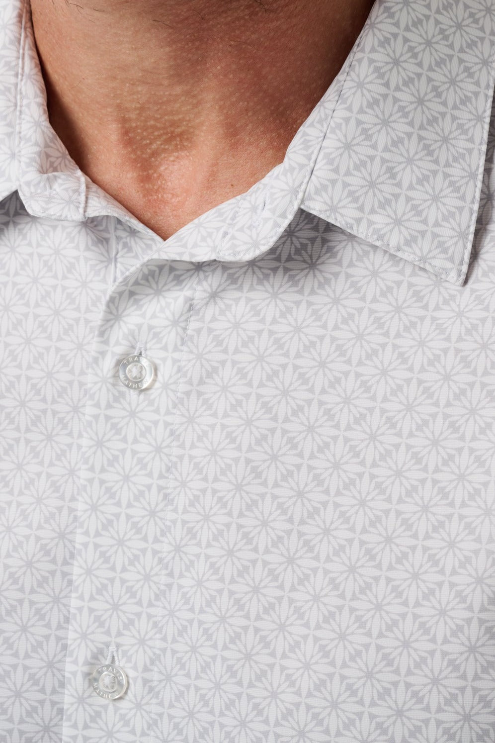 Travis Mathew Techwoven Flair Button-Up in White, detail view