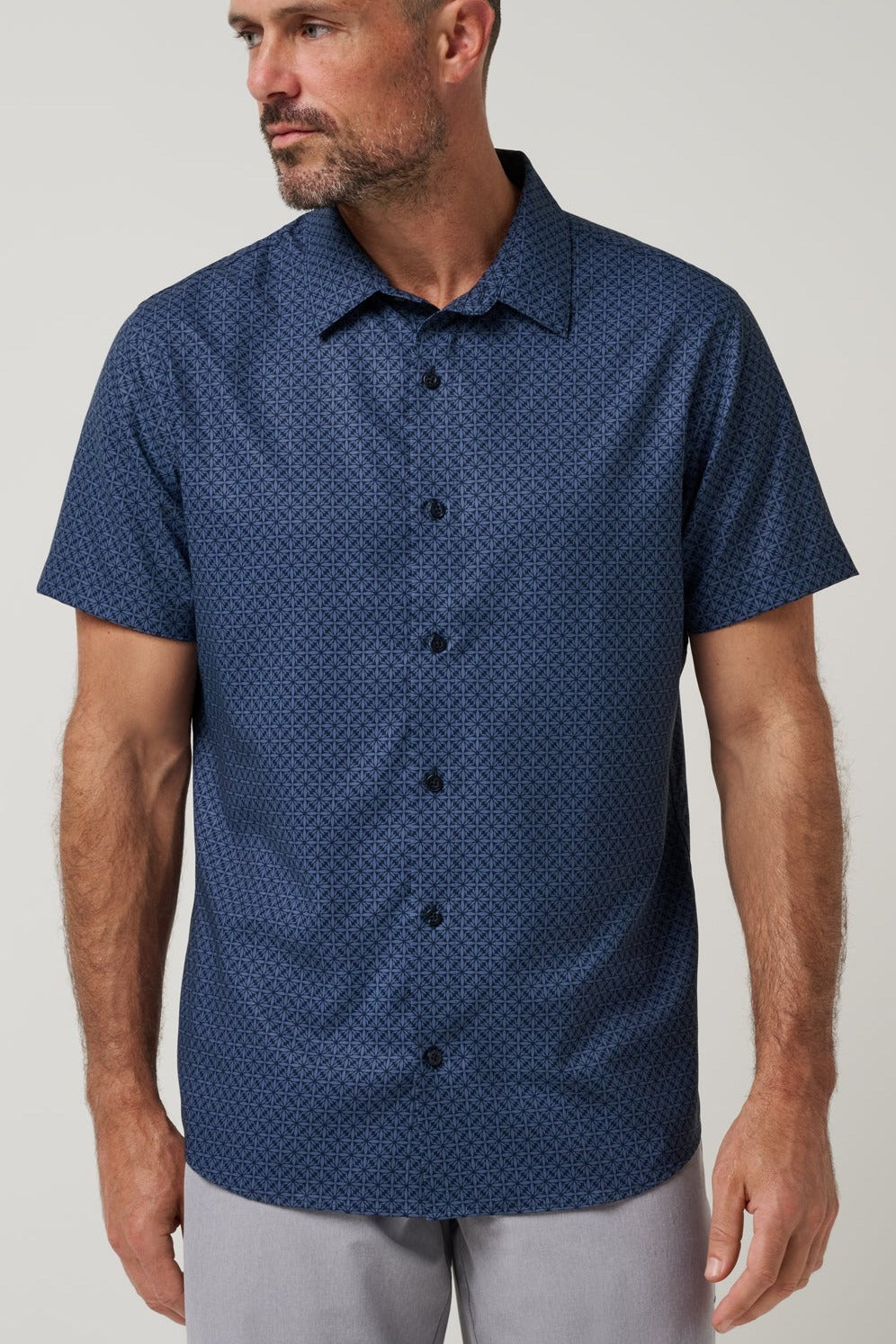Travis Mathew Techwoven Flair Button-Up in Total Eclipse, front view