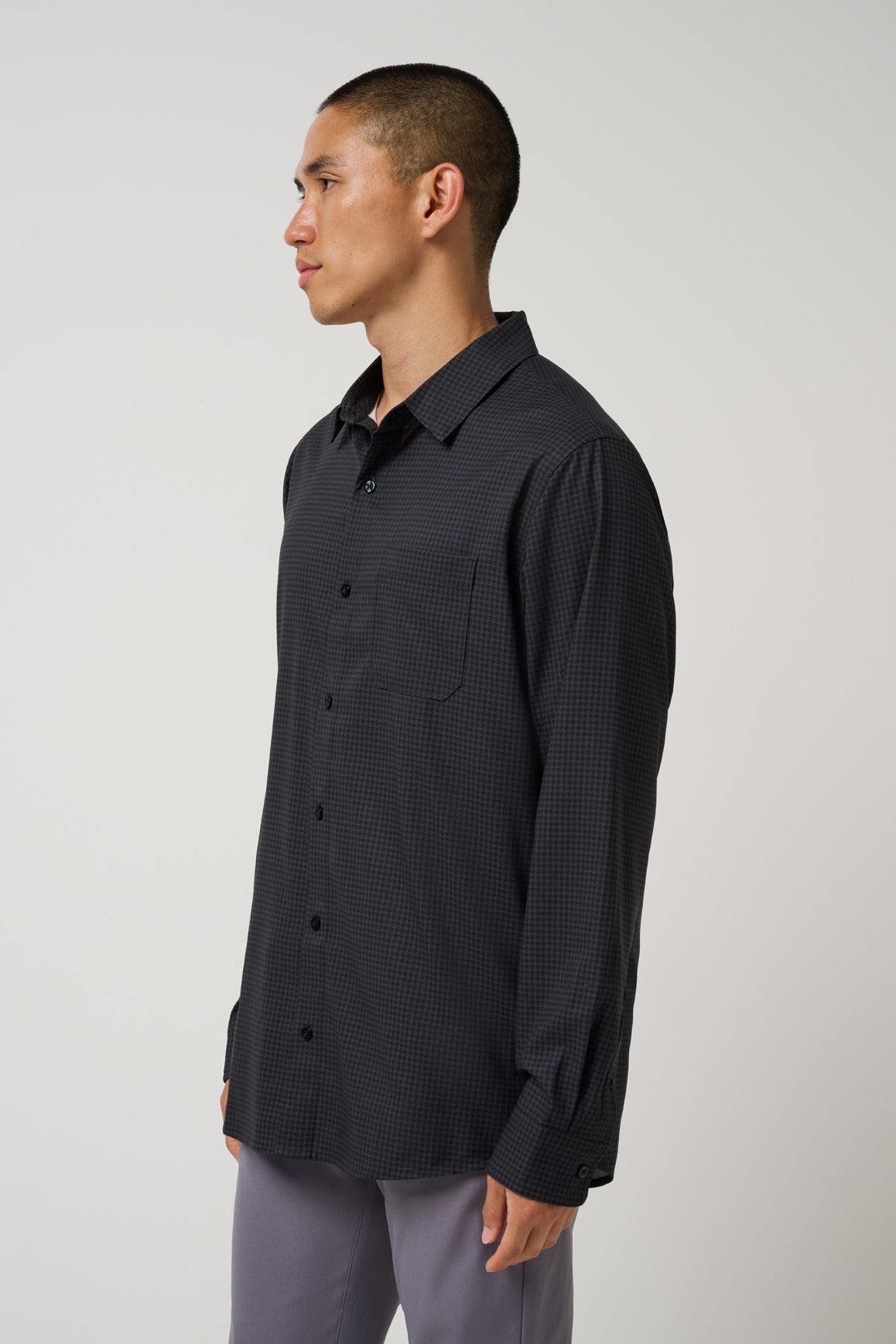 Travis Mathew Techwoven Cross Check Button-Up in Black, side view