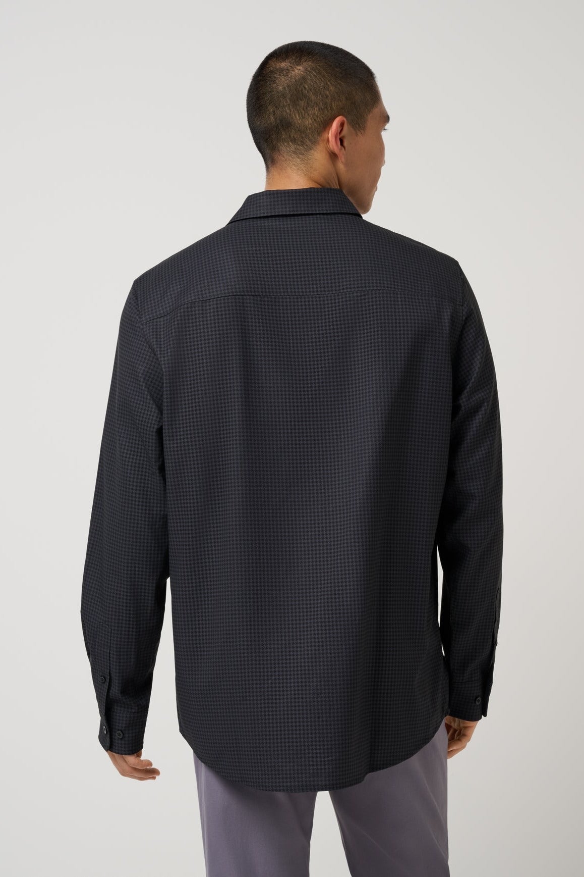 Travis Mathew Techwoven Cross Check Button-Up in Black, back view
