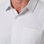 Close up of the tonal check weave and chest pocket on the White Techwoven Cross Check Button-Up