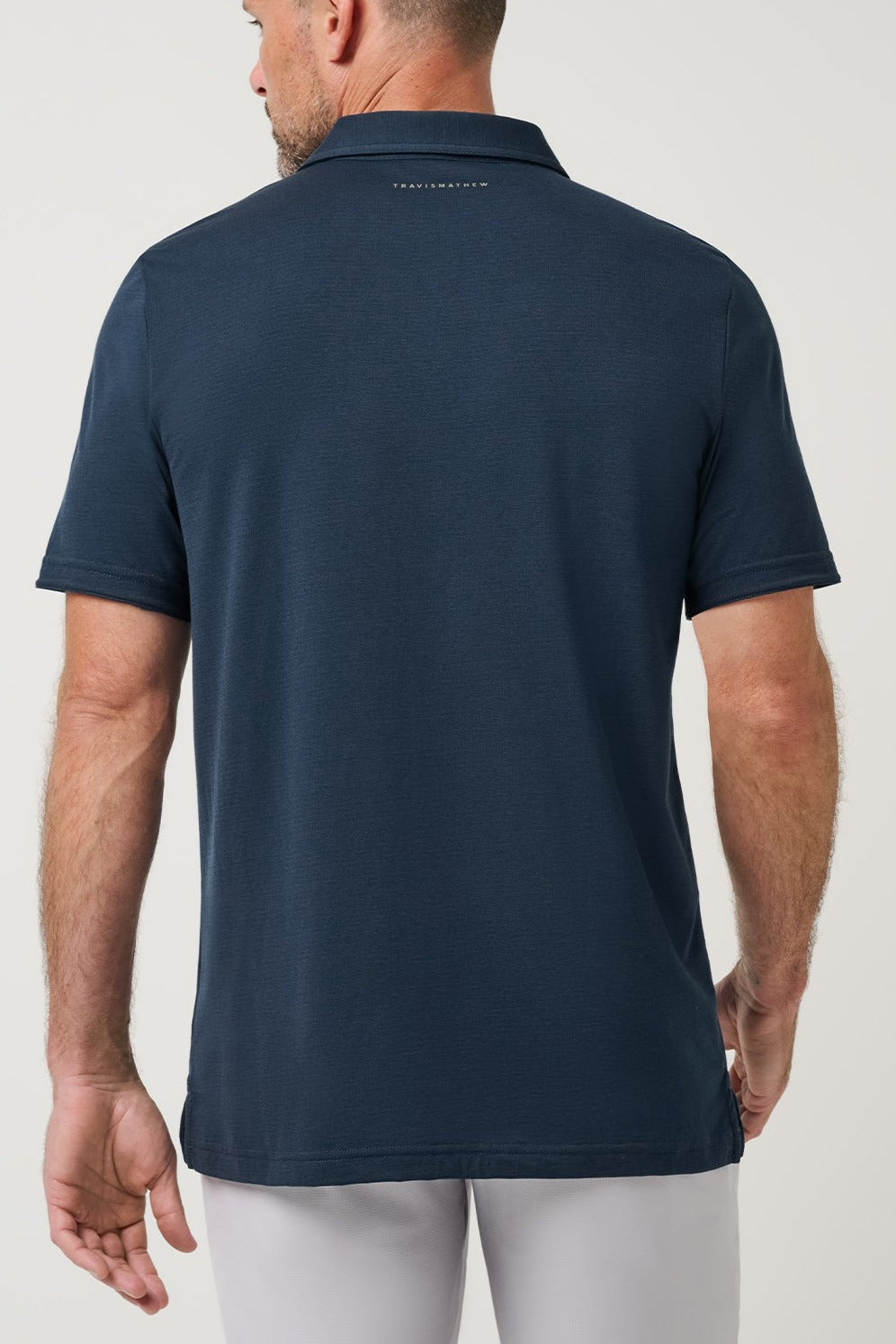 Travis Mathew Heater Series Jersey Polo in Total Eclipse, back view