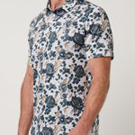 Travis Mathew Featherweight Villa Polo in White, side view