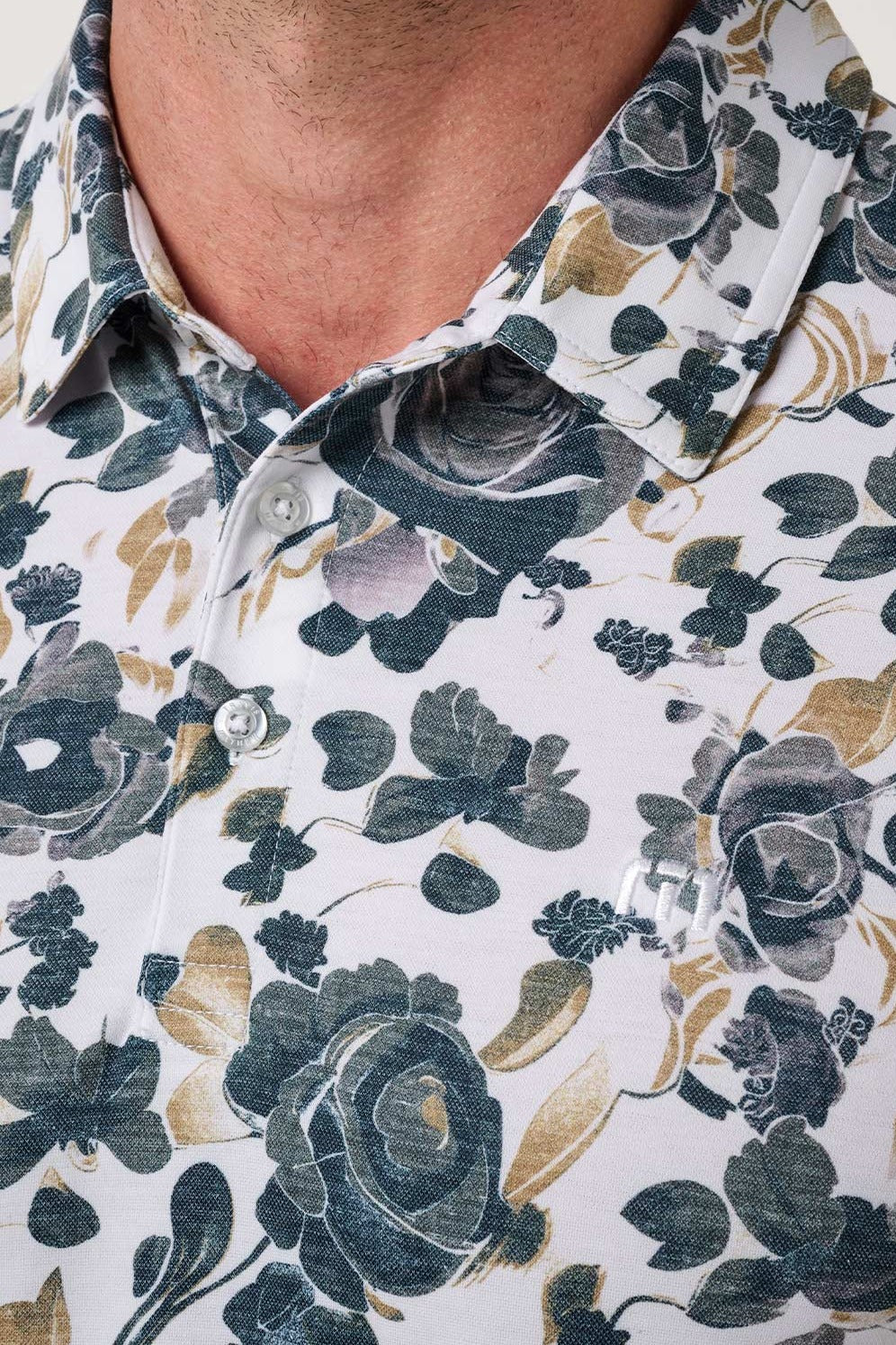 Travis Mathew Featherweight Villa Polo in White, floral print detail