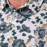 Travis Mathew Featherweight Villa Polo in White, floral print detail