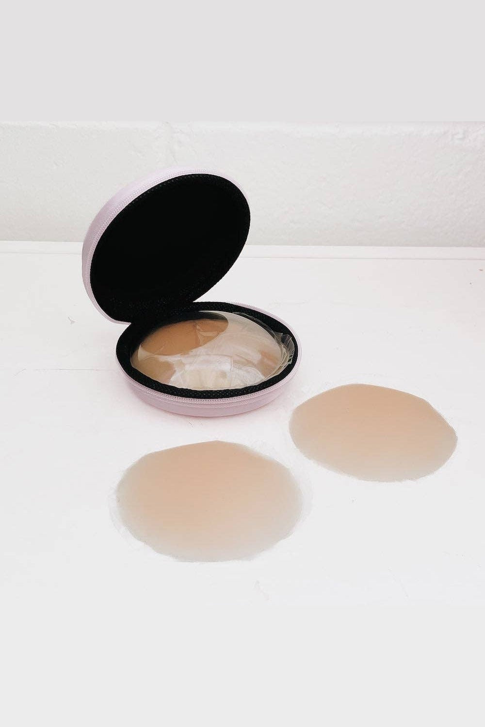 Reusable nipple covers in caramel with storage case