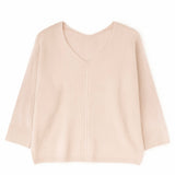 Beige blouse on a white background