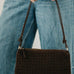 Suede Harper Hobo Shoulder Bag in Black worn on the shoulder