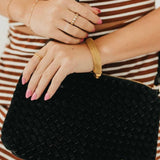 Suede Harper Hobo Shoulder Bag in Black held at the hip