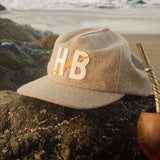 Howler Bros Big HB snapback in Cowhide, worn