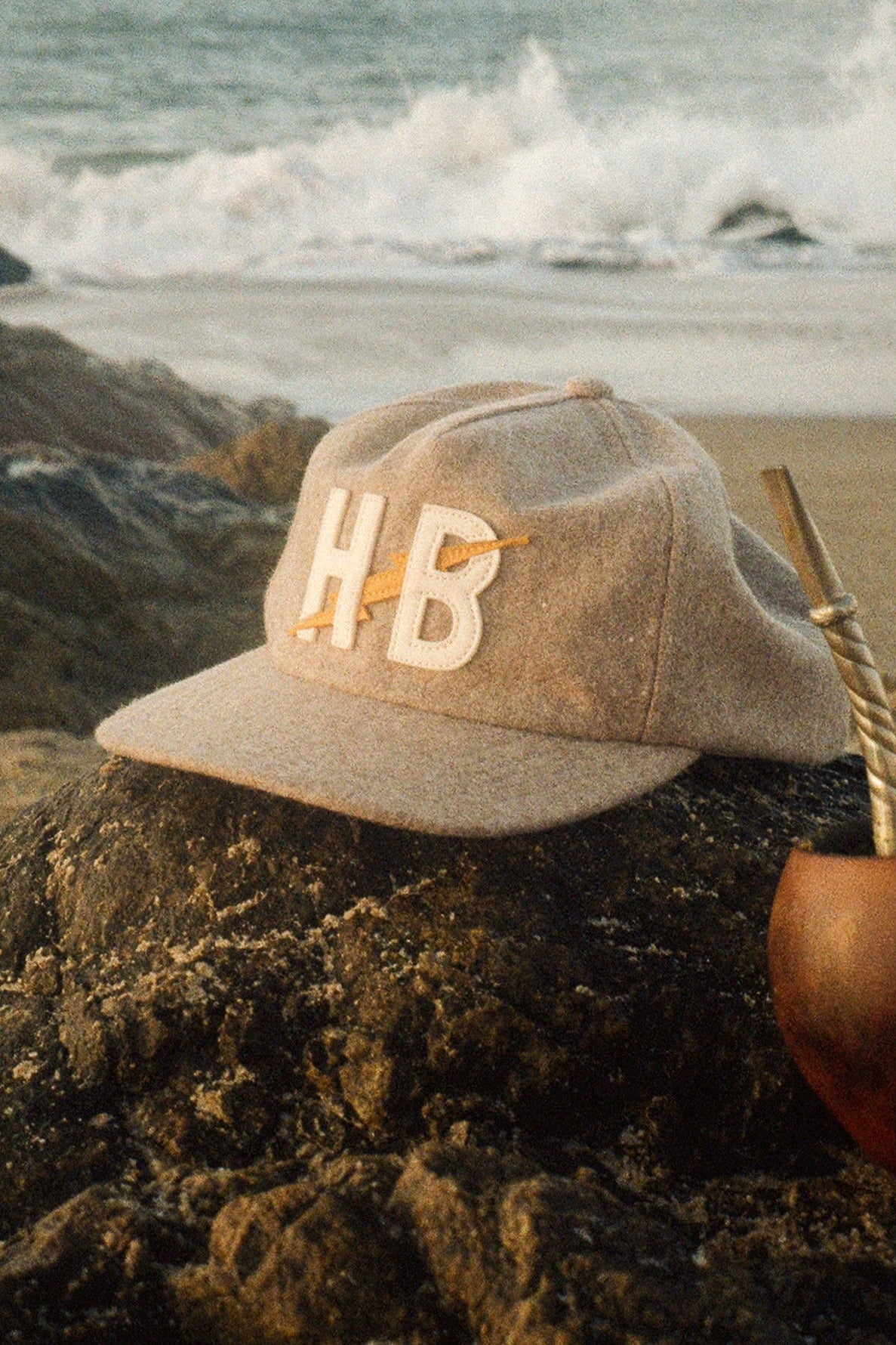 Howler Bros Big HB snapback in Cowhide, worn