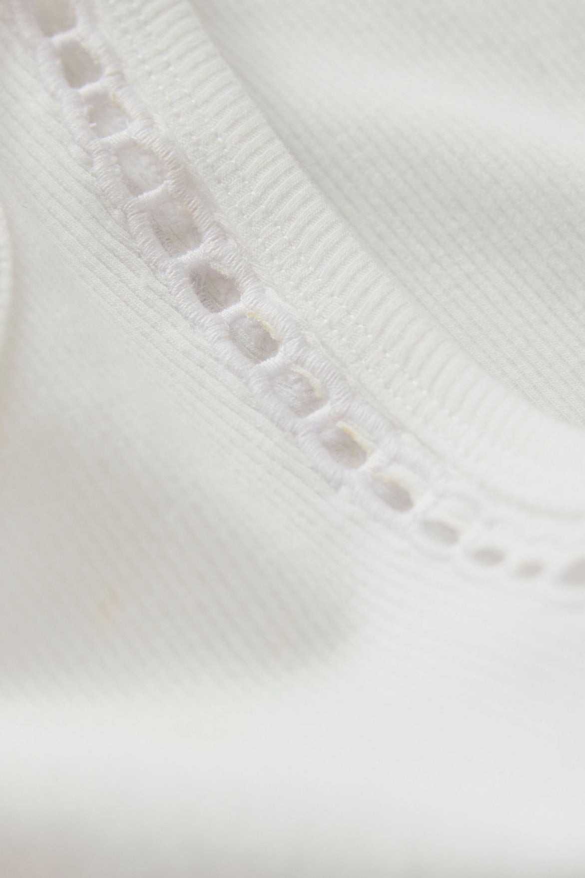 Z Supply Boa Rib Tank in White, eyelet trim detail