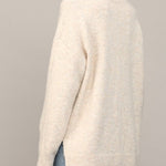 Oatmeal V-neck sweater shoulder and side slit detail