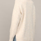 Oatmeal V-neck sweater shoulder and side slit detail