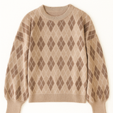 Beige sweater with argyle pattern on a white background