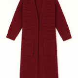 Red knitted cardigan on a white background