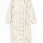 White knitted cardigan on a white background