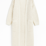 White knitted cardigan on a white background