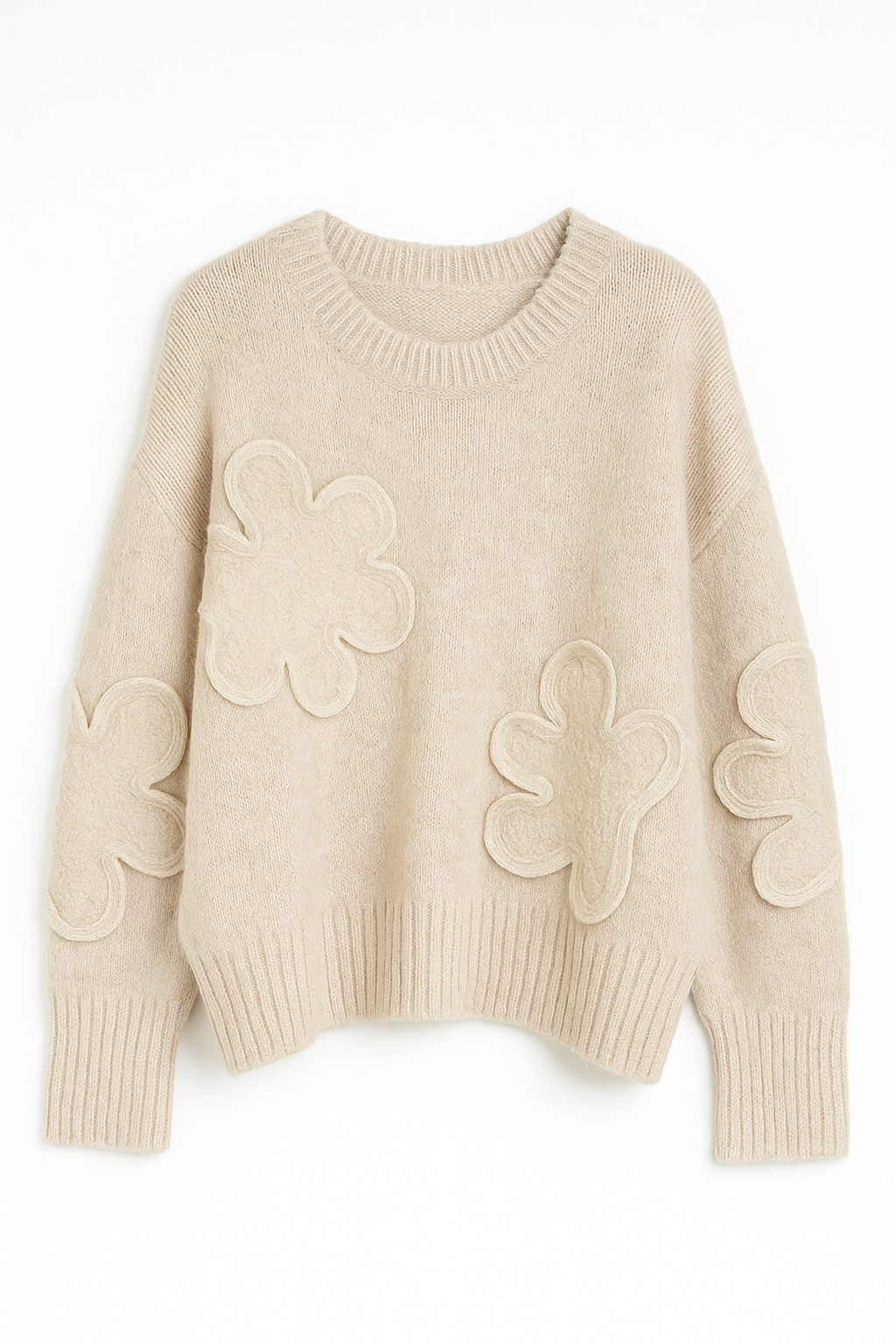 Beige sweater with floral patterns on a white background