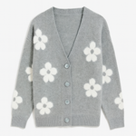 Gray cardigan with white floral patterns on a light gray background