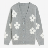 Gray cardigan with white floral patterns on a light gray background