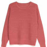 Rose colored women's sweater on white background