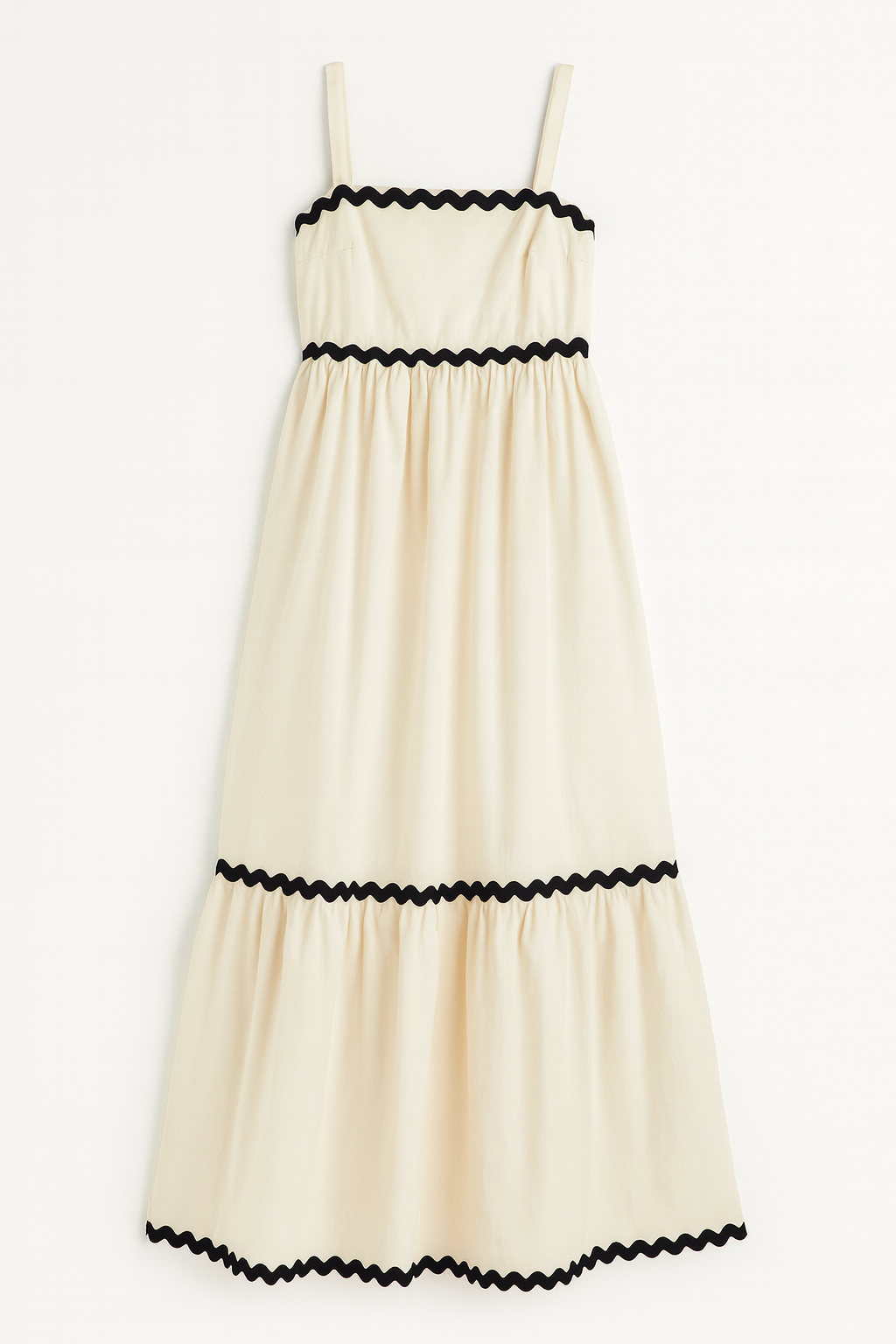 Beige dress with black trim on a white background