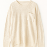 Beige sweater on a white background