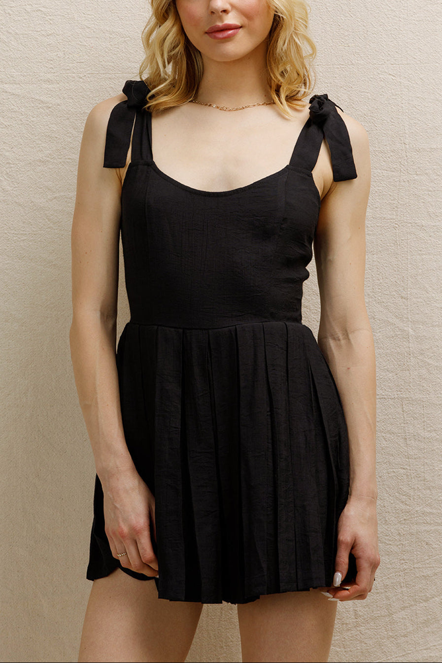 Lovey Dovey Pleated Romper in Black - front