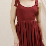 Lovey Dovey Pleated Romper in Wine - front