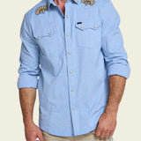Howler Bros Crosscut Deluxe Snapshirt Fanned Flora on model, front
