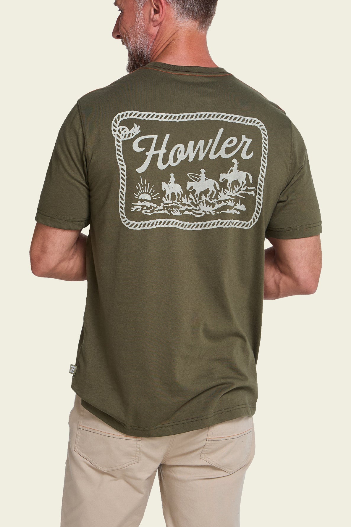 Howler Bros Howler Posse T-Shirt Dark Olive on model, back