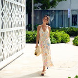Z&L Europe Floricana Maxi Dress in multi color floral viscose worn outdoors, walking away