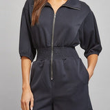 Sloane Zip Front Smocked Romper in Black - front view