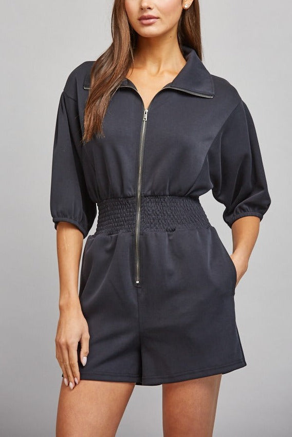 Sloane Zip Front Smocked Romper in Black - front view
