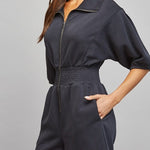 Sloane Zip Front Smocked Romper in Black - side view with pocket