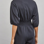 Sloane Zip Front Smocked Romper in Black - back view