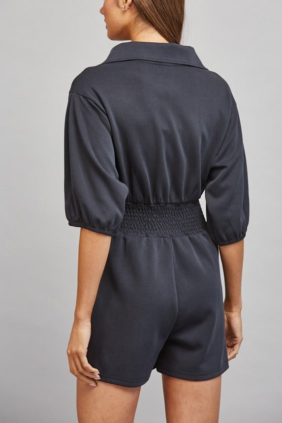 Sloane Zip Front Smocked Romper in Black - back view