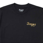 Close up of the Russ chest logo on the black tee