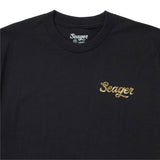 Close up of the Russ chest logo on the black tee