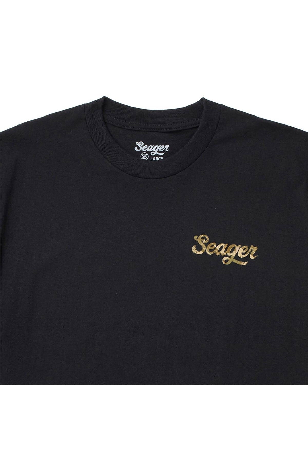 Close up of the Russ chest logo on the black tee