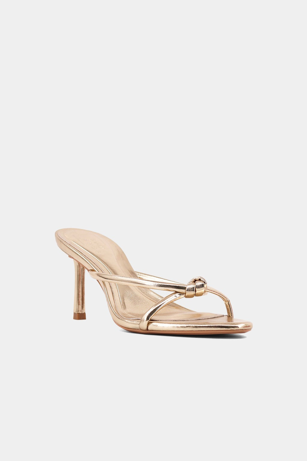 Heidi knotted strap heeled sandal in gold, angled front