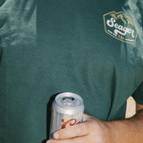 Man wearing the Seager High Country Tee in Forest Green, front view