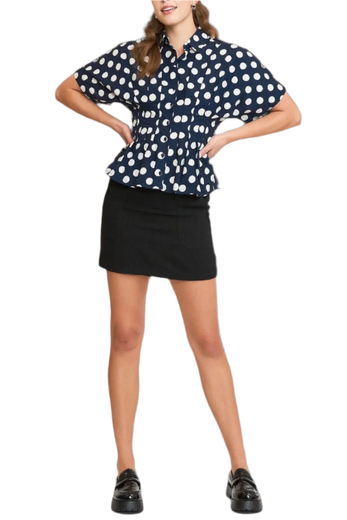 Woman wearing a navy blue polka dot blouse and black skirt on a transparent background