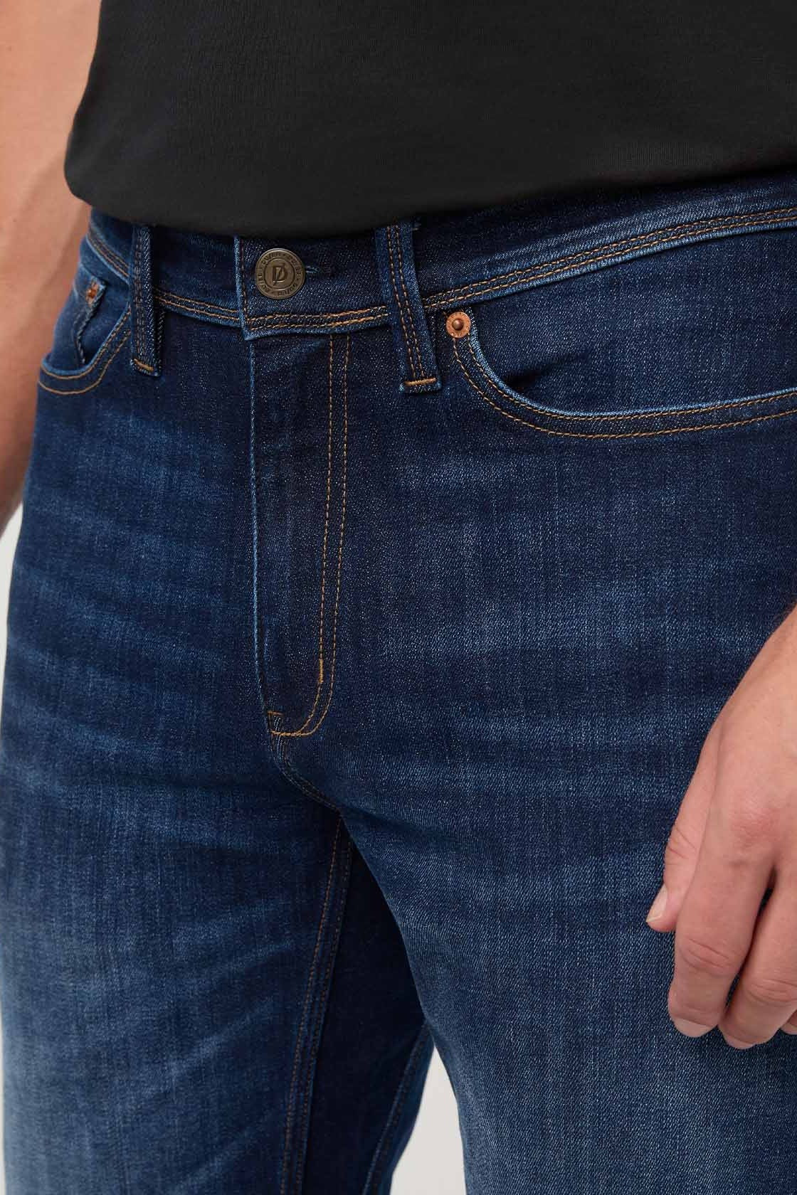DUER Performance Denim+ Straight in Heritage Indigo, waistband and leather patch detail
