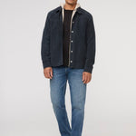 DUER Performance Denim+ Relaxed Straight in Dust Storm Indigo – front view