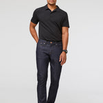 DUER Performance Denim Athletic Taper in Heritage Rinse, full length
