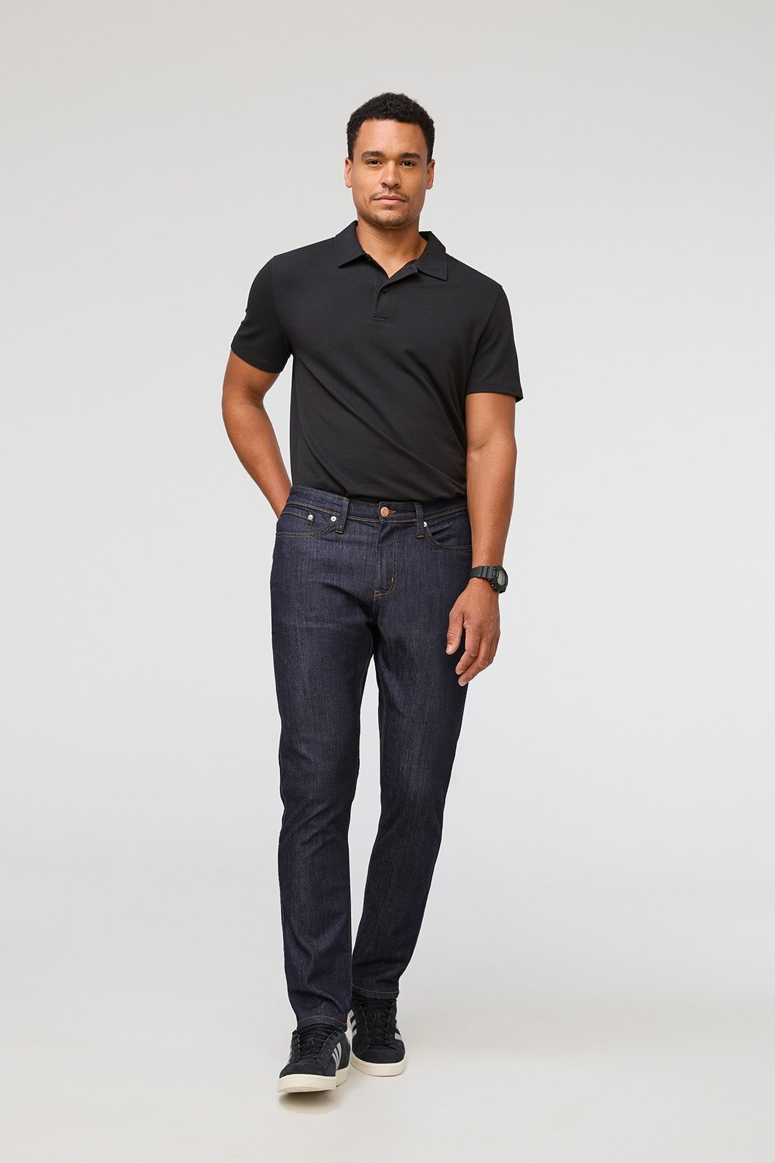 DUER Performance Denim Athletic Taper in Heritage Rinse, full length