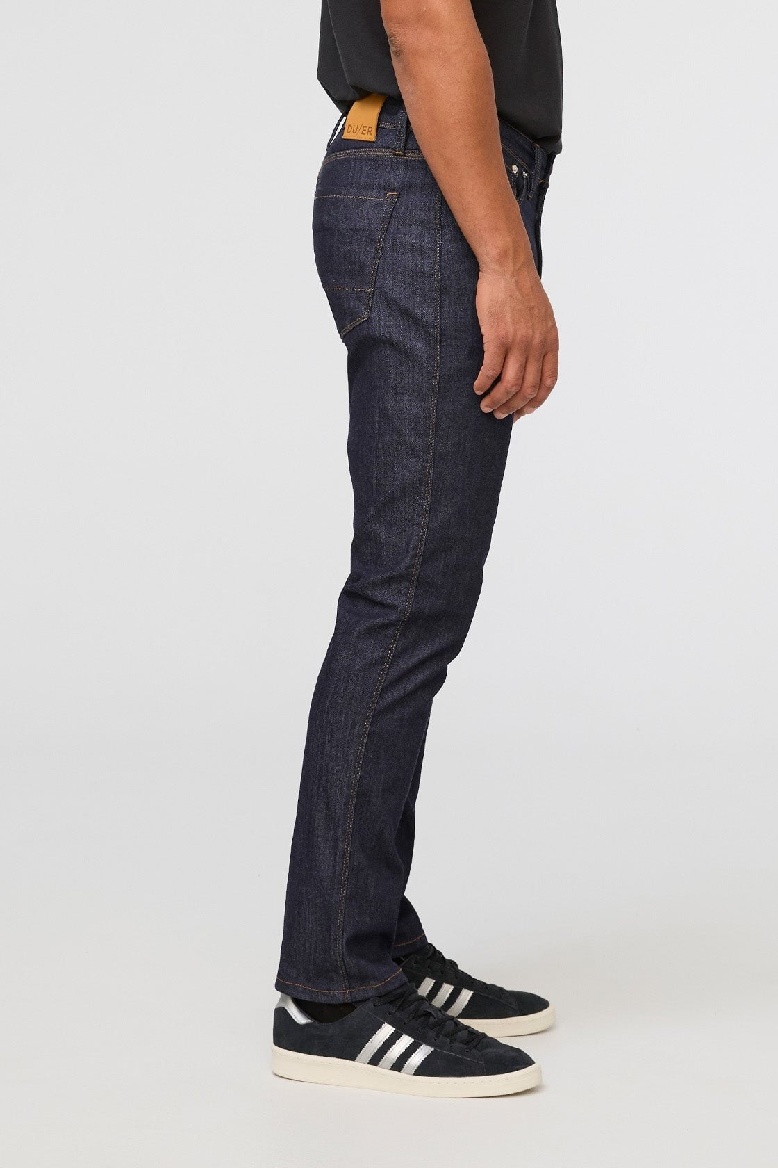 DUER Performance Denim Athletic Taper in Heritage Rinse, side