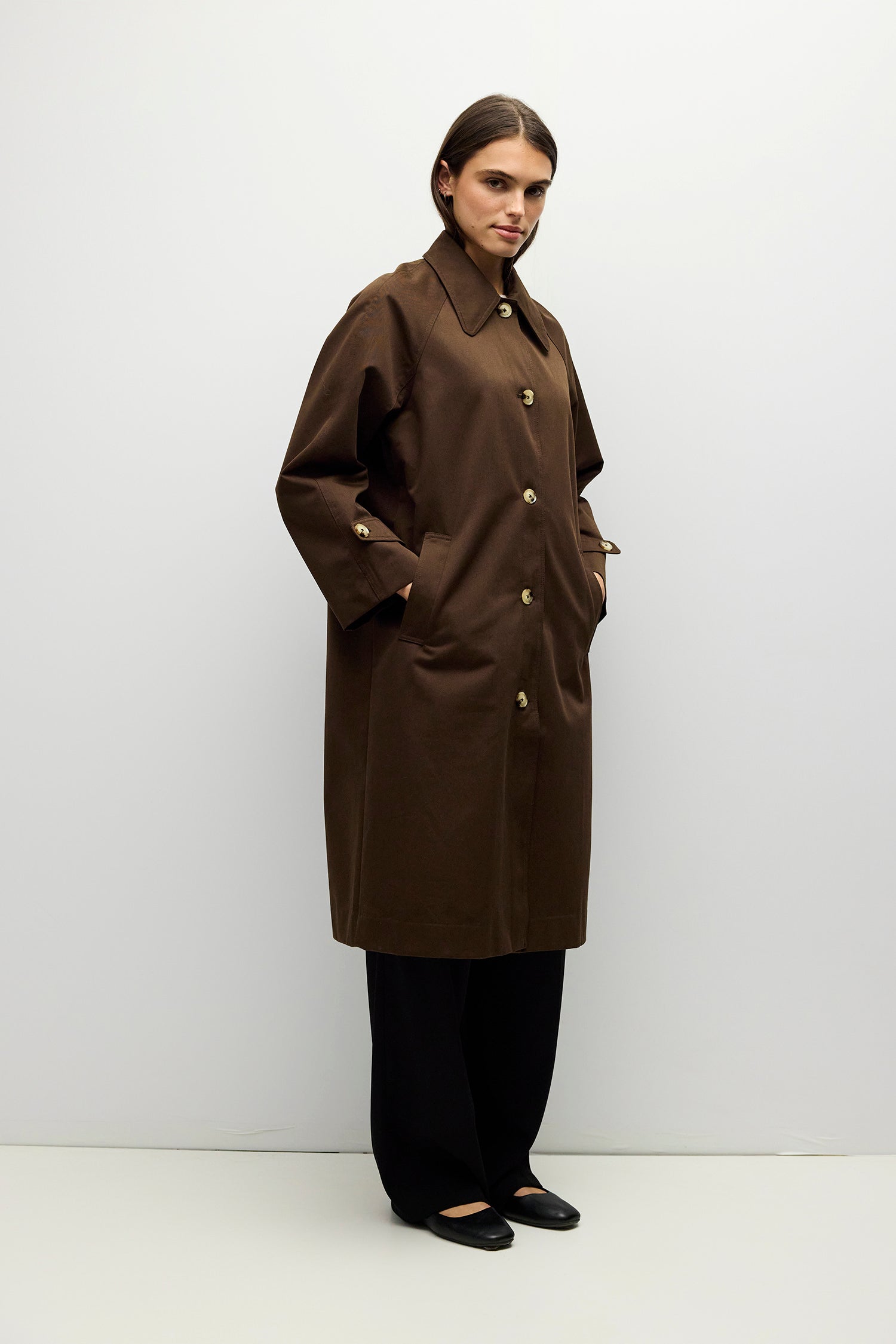 Brown midi trench coat, side view